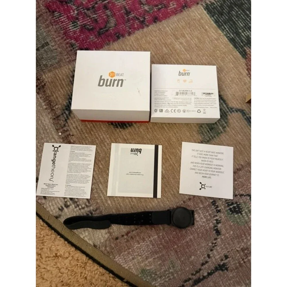 Orange theory heart monitor and box